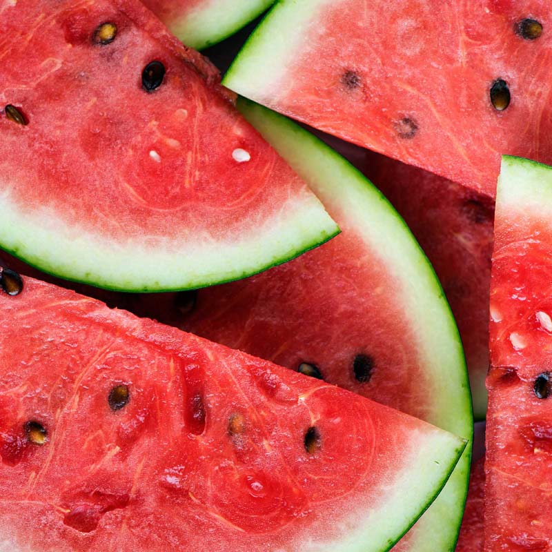 Close-up of sliced watermelon pieces with a focus on texture and color.